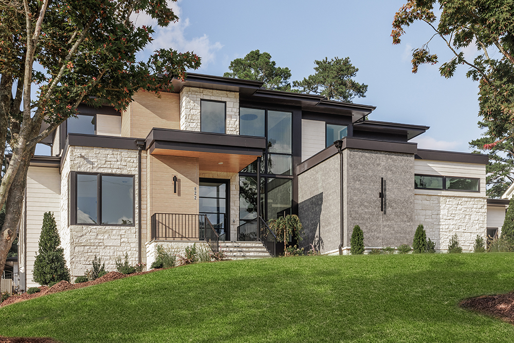 Picture of an exterior of a luxury home that is modern and angular in design.