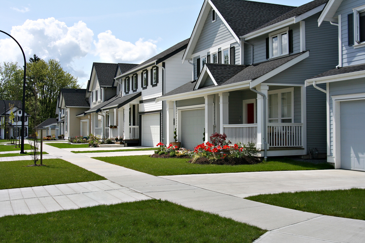 Street of new construction homes in suburban neighborhood
