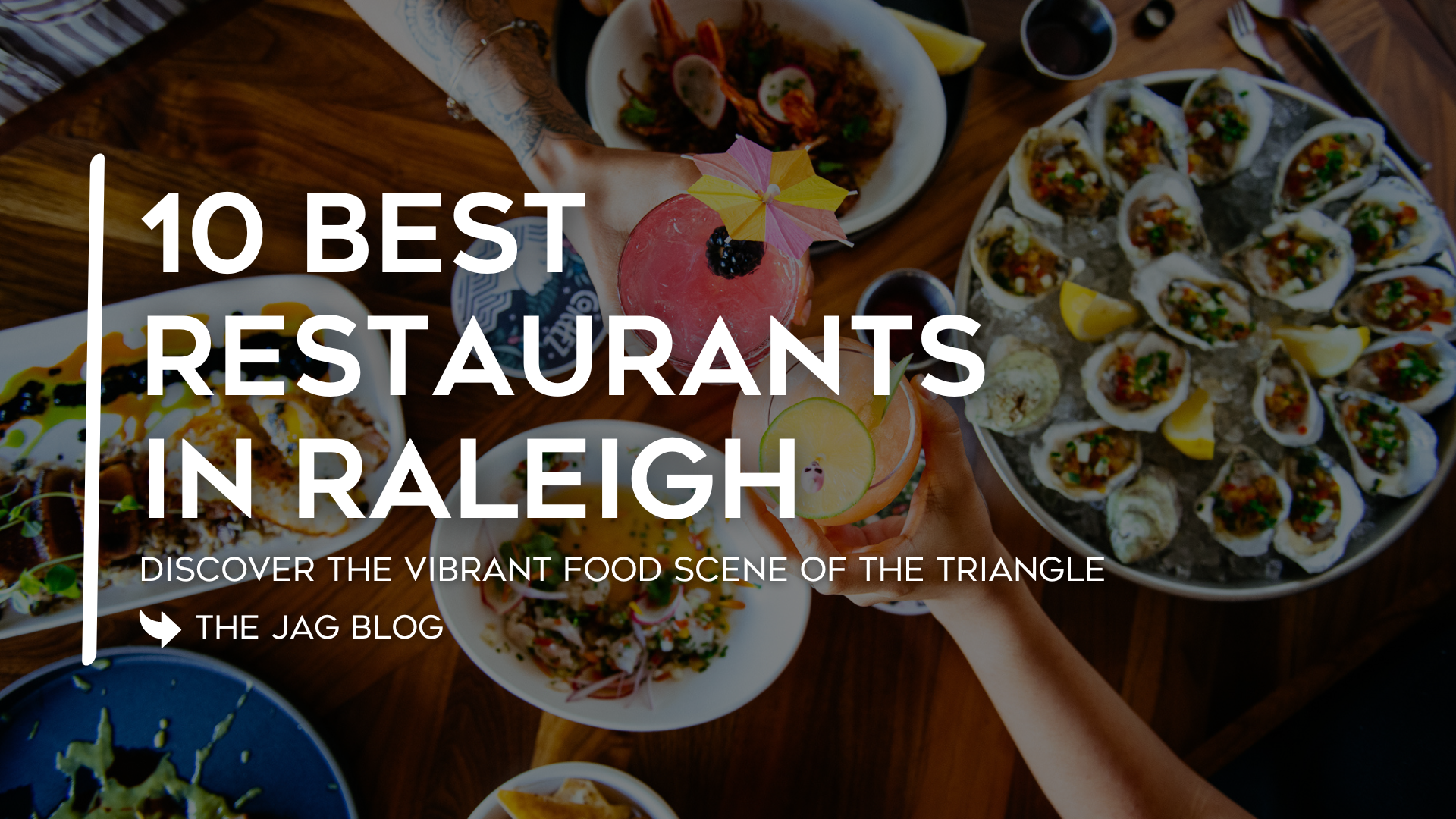 An image of two people cheersing glasses over seafood with a grey overlay and text that says "10 Best Restaurants in Raleigh"