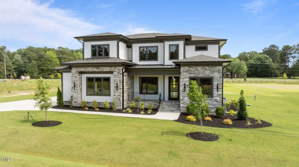 A single-family home in Grandiflora in Youngsville. If you're weighing a townhome vs single-family new construction, a single-family home will offer space to grow.